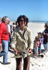 Diana Rushing's MCTMN badge gets her into helping with a rehabbed turtle release.