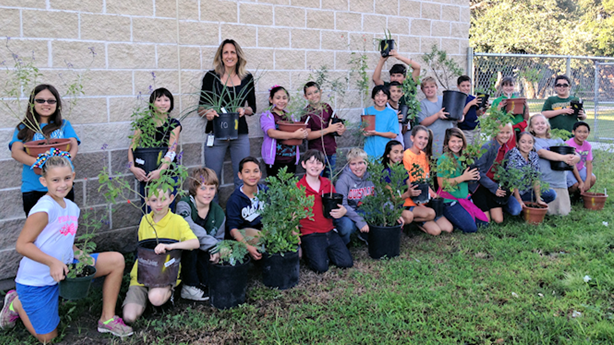 Fulton Learning Center 5th graders prepare to plant native plants for butterflies and pollinators